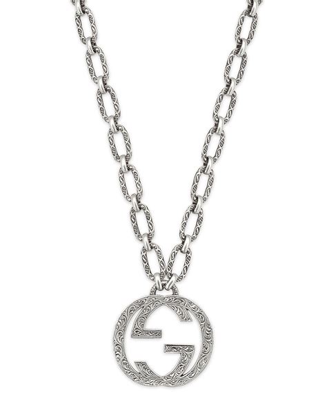 interlocking g charm gucci|Gucci interlocking g heart necklace.